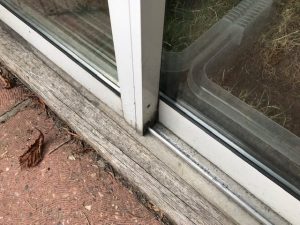 how to fix sliding glass door track problems